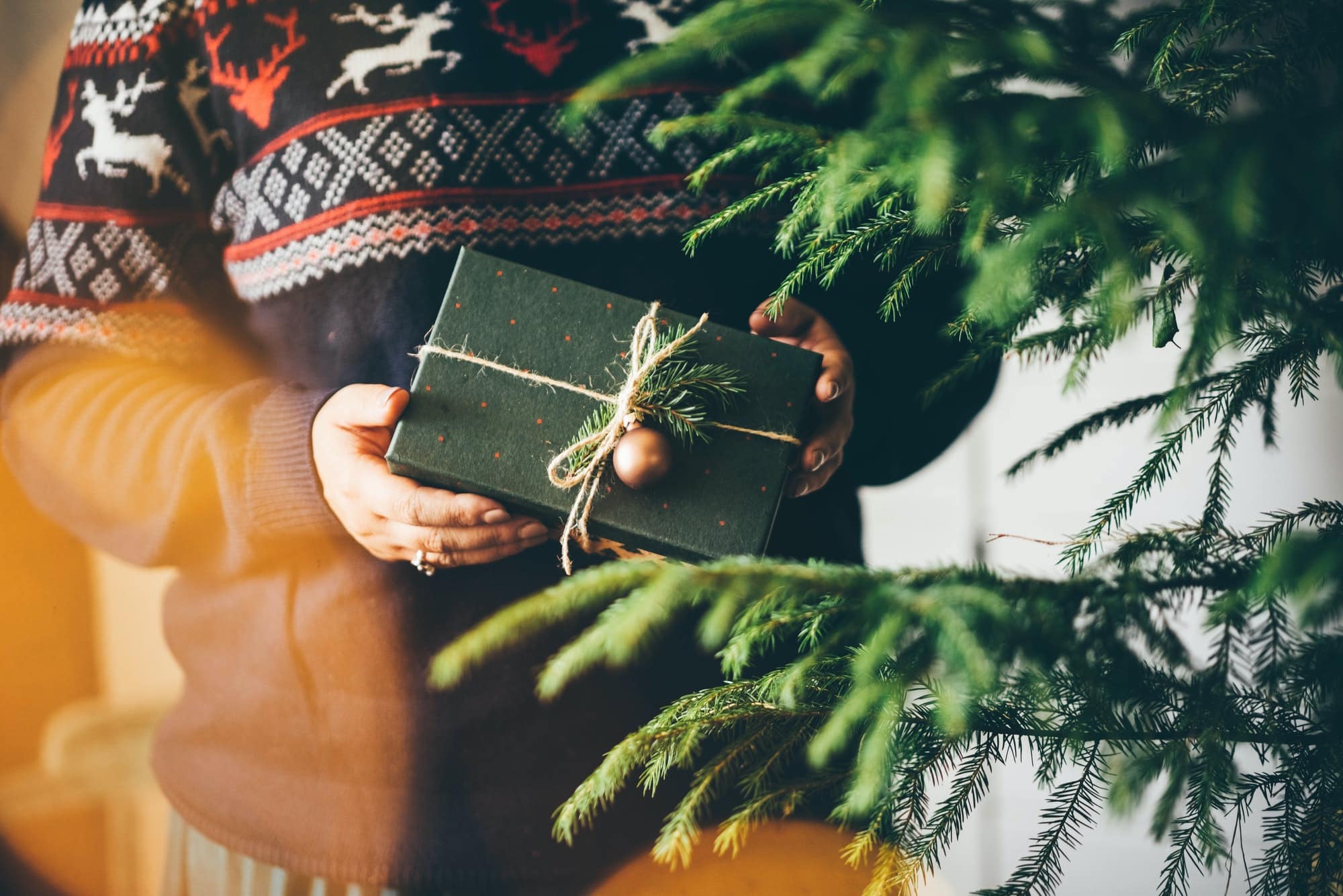 Woman preparing presents for Christmas.