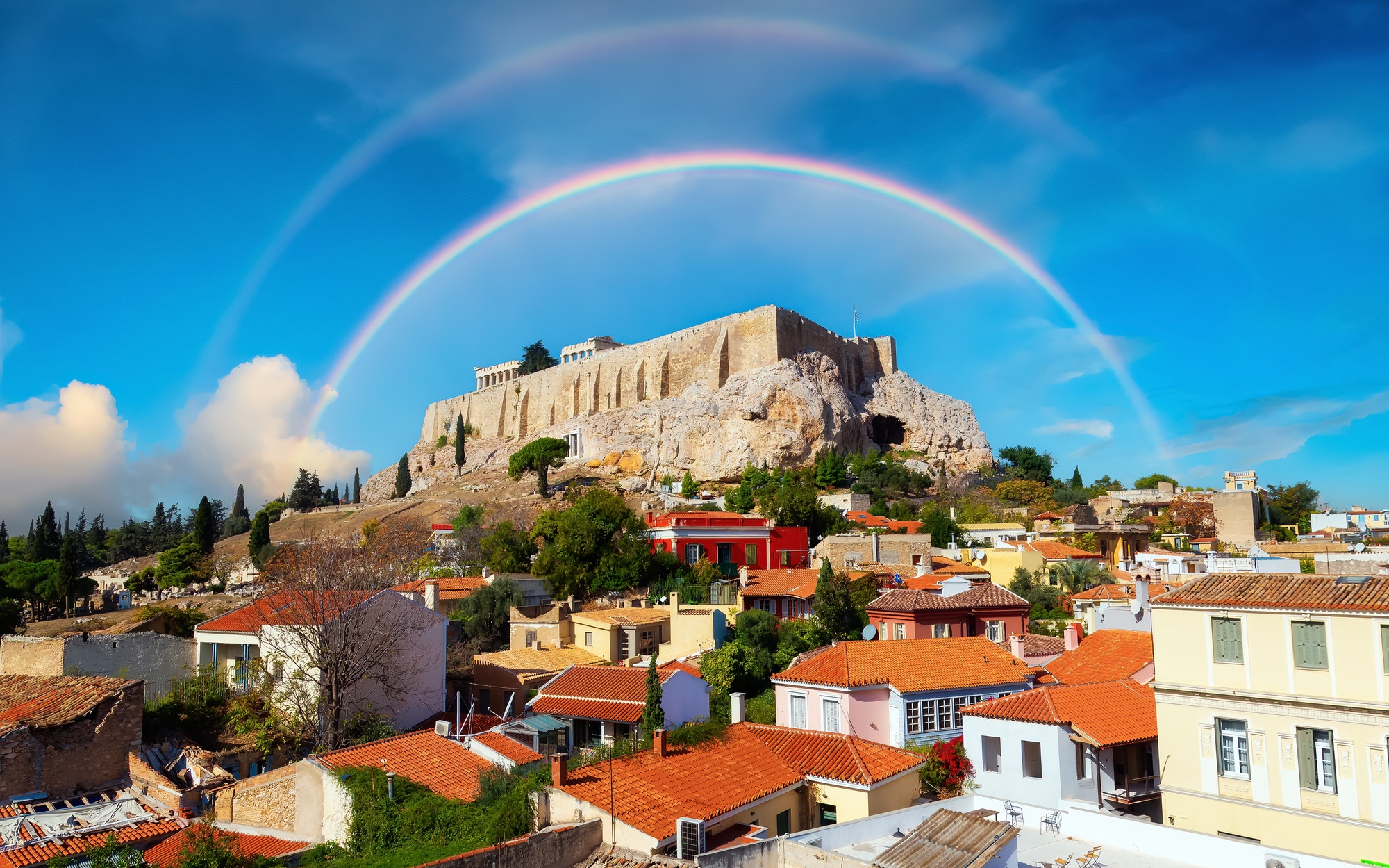 Acropolis and Cityscape in a Historic City with Mountain. Areopagus Hill, Athens, Greece.