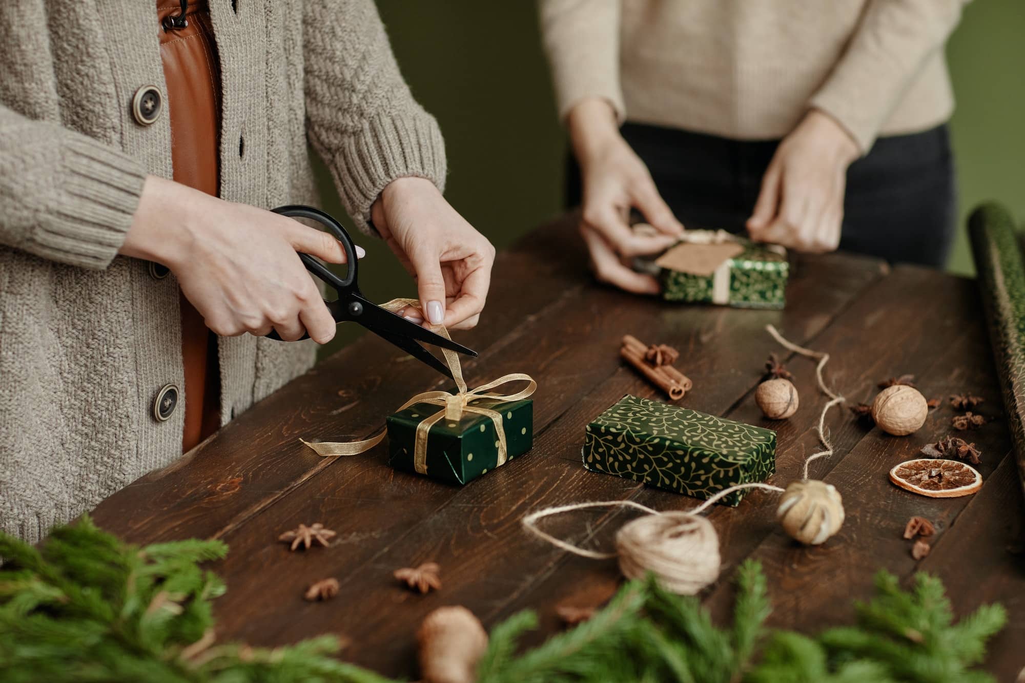 People Wrapping Christmas Presents